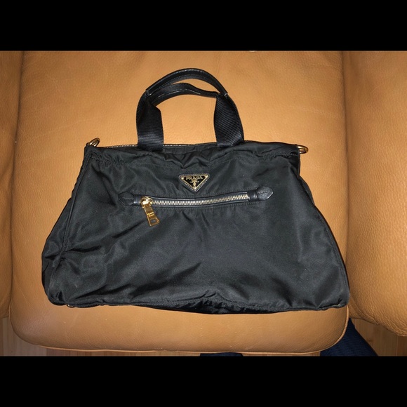 black prada bag with gold hardware